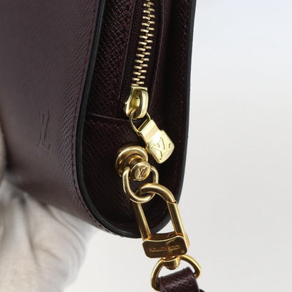 Louis Vuitton Pochette Baikal Clutch Taiga Leather, BROWN, LEATHER, Clutche & pouche