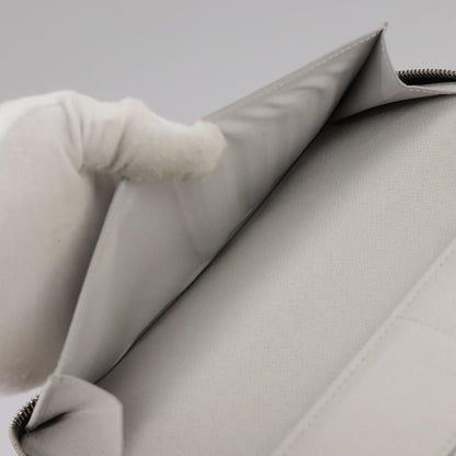 Louis Vuitton Zippy wallet vertical Taiga leather, WHITE, LEATHER, Wallets