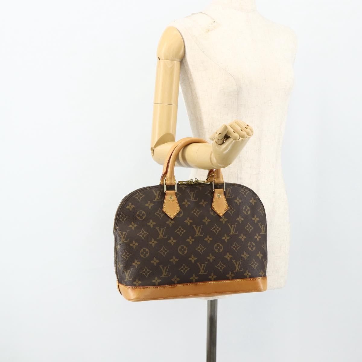 Louis Vuitton Alma Handbag Monogram Canvas, Brown, Canvas, Handbag