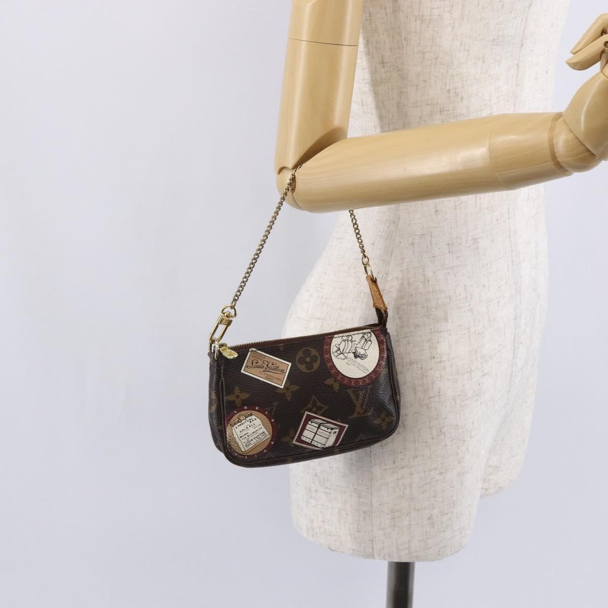 Louis Vuitton Mini pochette accessoire Limited edition Monogram canvas, BROWN, CANVAS, Accessory