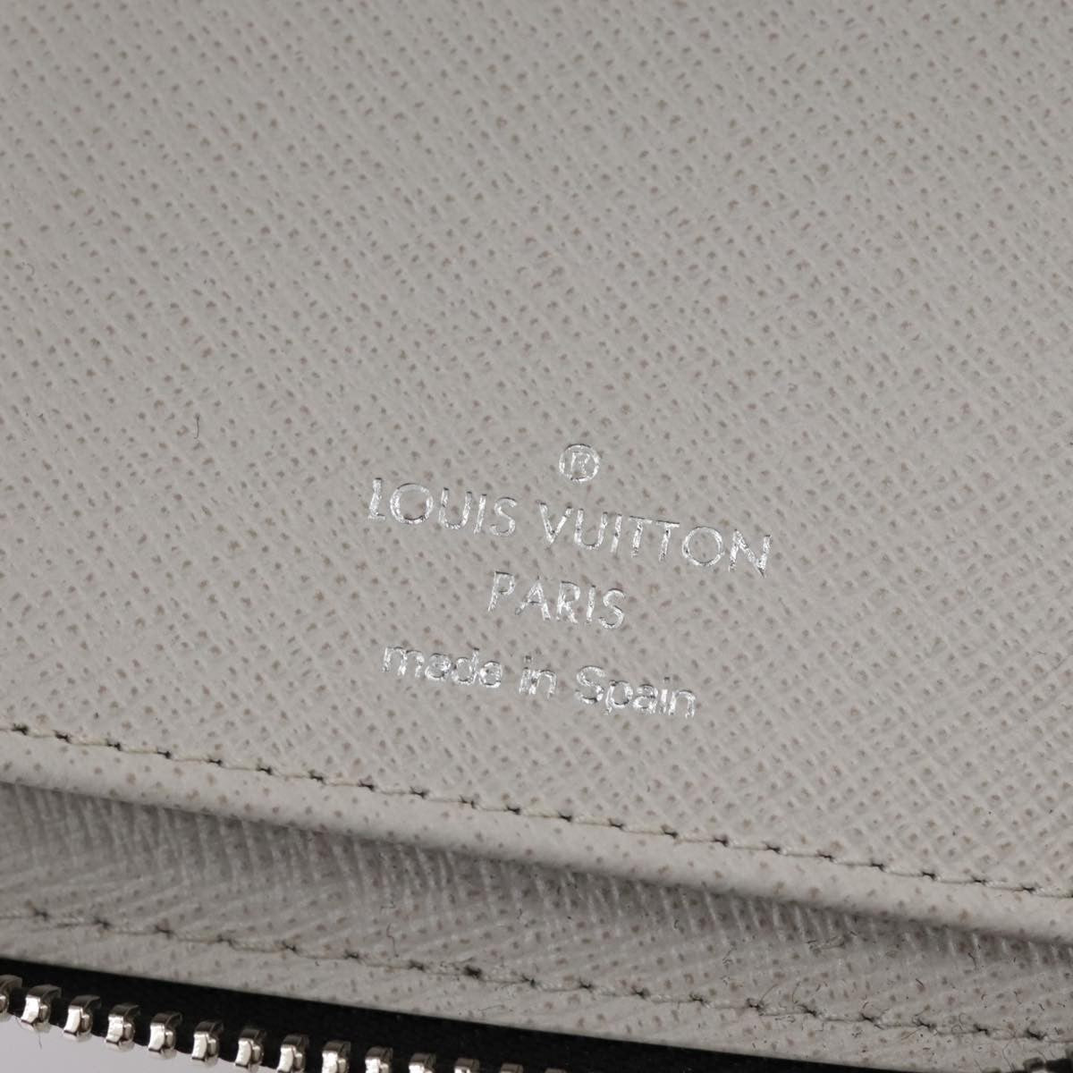 Louis Vuitton Zippy wallet vertical Taiga leather, WHITE, LEATHER, Wallets
