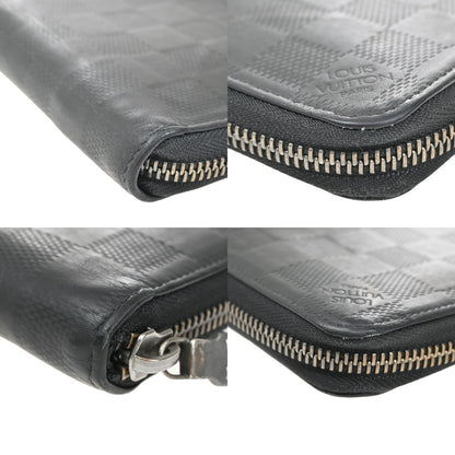 Louis Vuitton Zippy wallet vertical Damier Infini Leather, BLACK, LEATHER, Wallets
