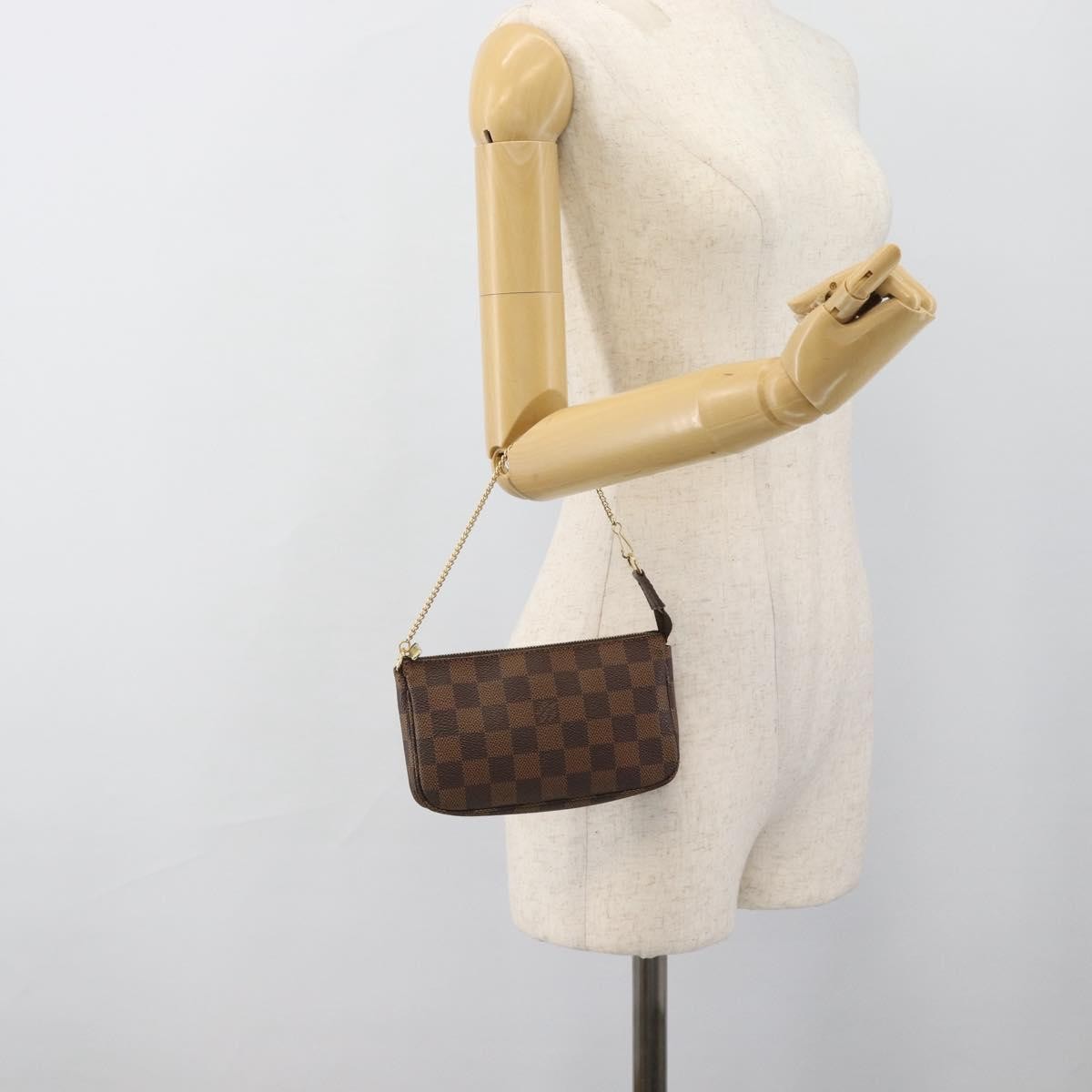Louis Vuitton Mini pochette accessoires Damier Canvas, Brown, Canvas, Clutch