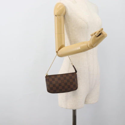 Louis Vuitton Mini pochette accessoires Damier Canvas, Brown, Canvas, Clutch