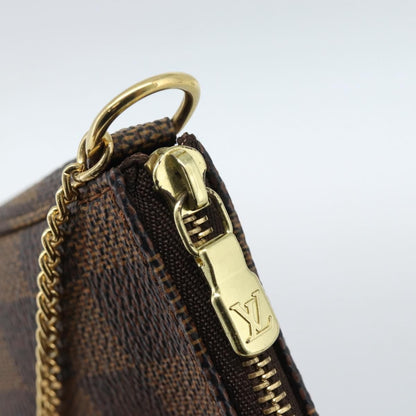 Louis Vuitton Mini pochette accessoires Damier Canvas, Brown, Canvas, Clutch