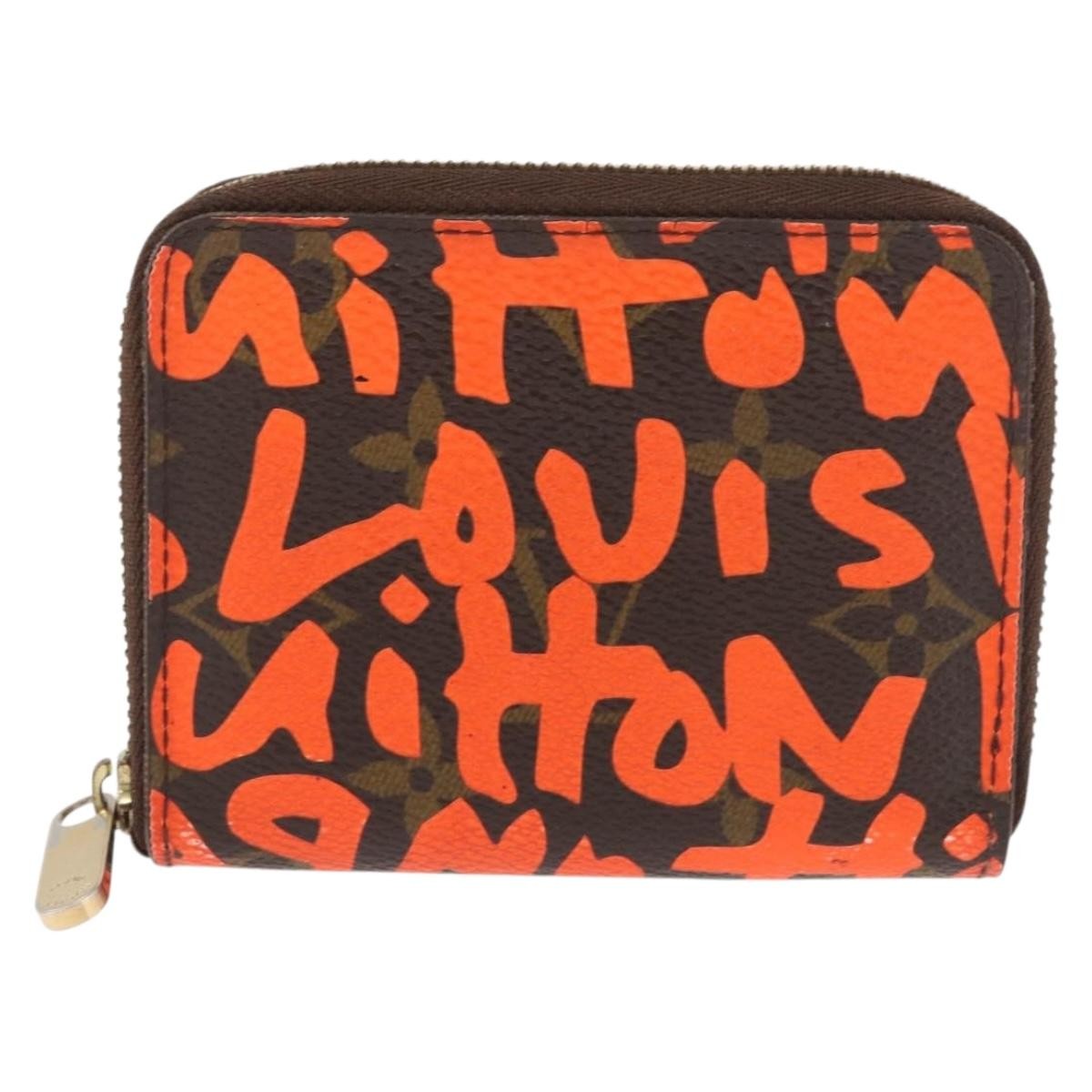 Louis Vuitton Porte-Monnaie Zippy Wallet monogramme empreinte, Orange, Canvas, Wallet