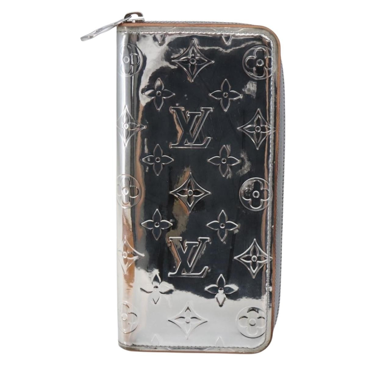 Louis Vuitton Zippy wallet vertical Monogram mirror, SILVER, CANVAS, Wallets
