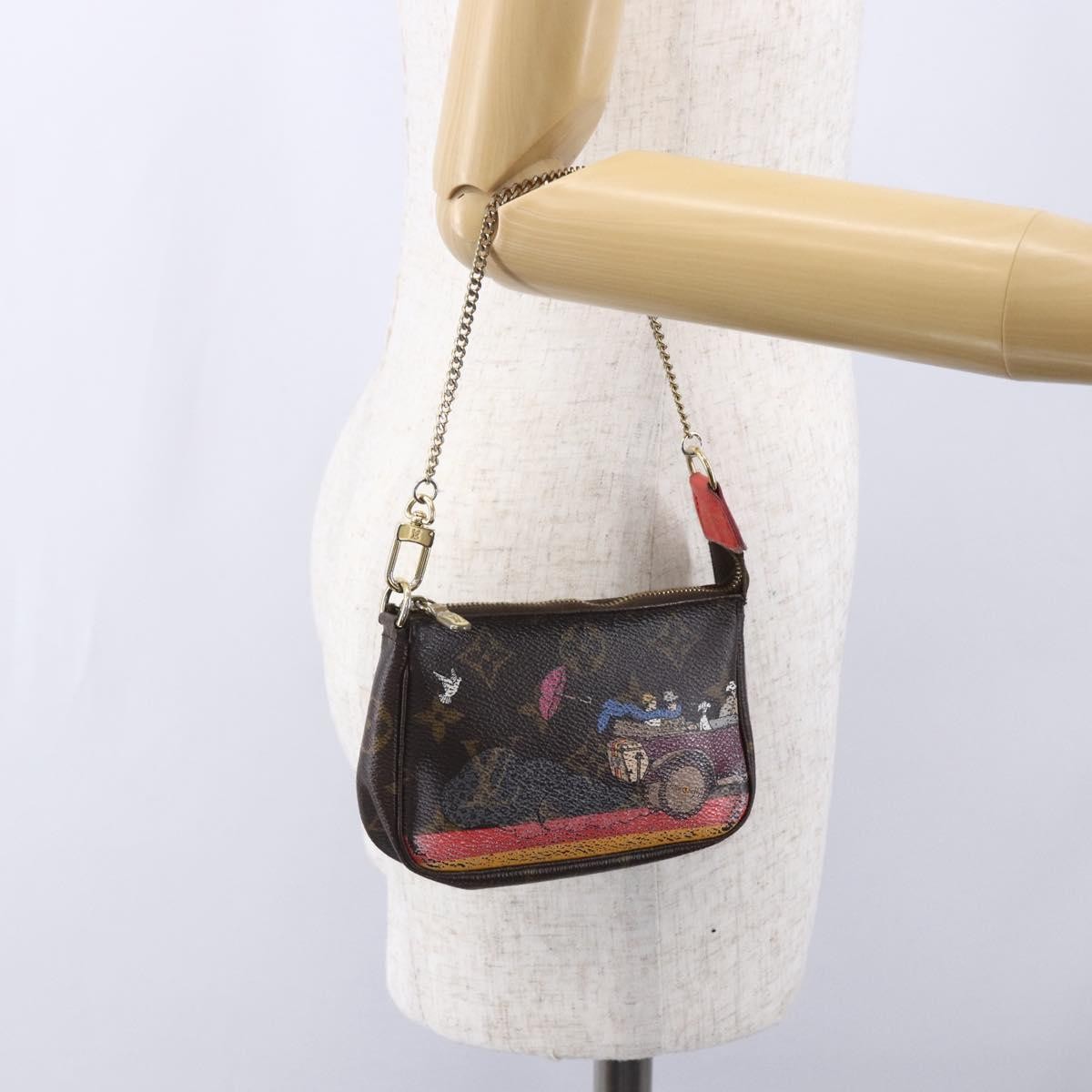 Louis Vuitton Pochette Accessoires Limited Edition Christmas Animation Monogram Canvas, BROWN, CANVAS, Clutche & pouche