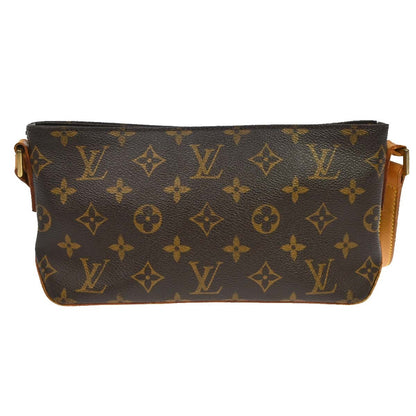 Louis Vuitton Trotteur Handbag Monogram Canvas, Brown, Canvas, Clutch