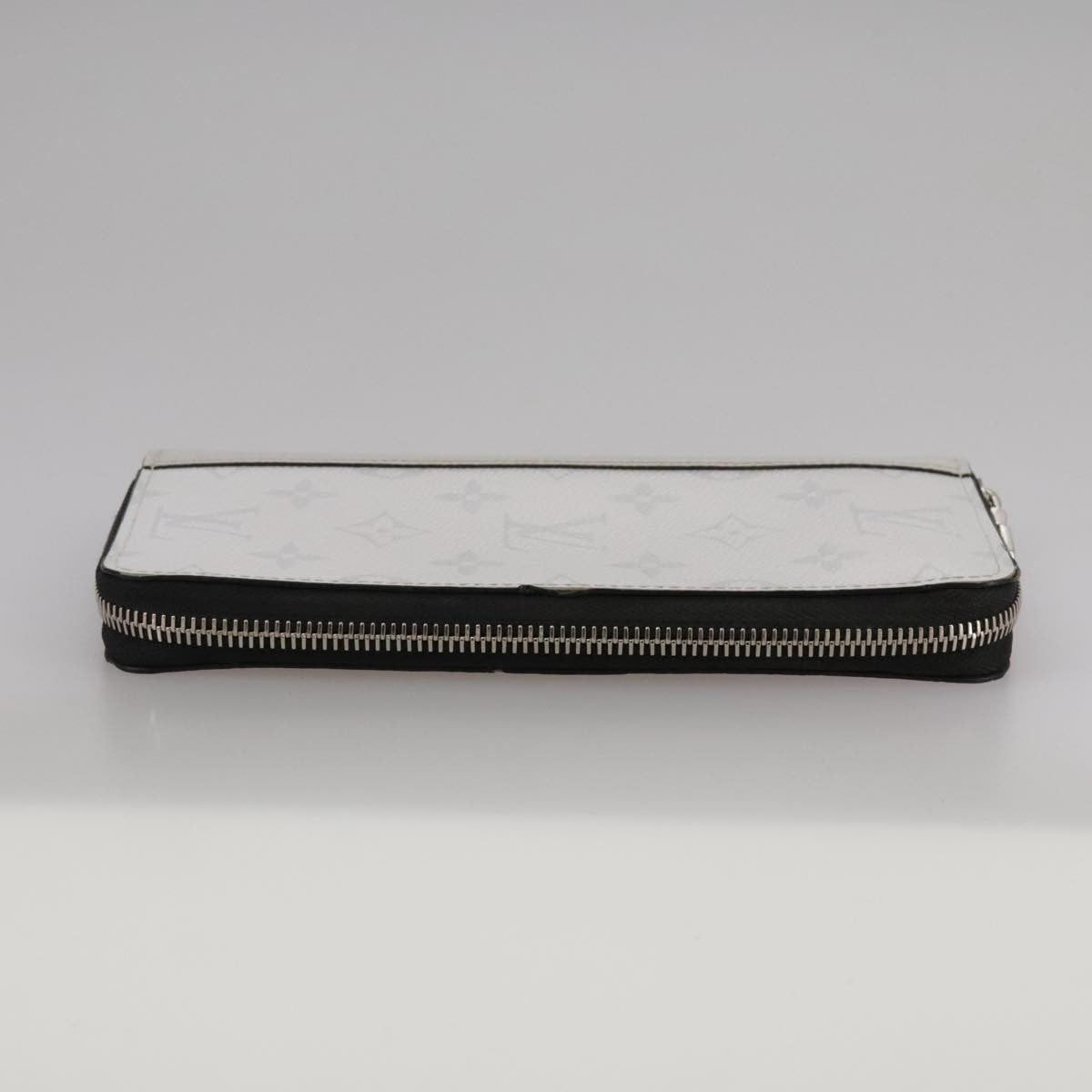Louis Vuitton Zippy wallet vertical Taiga leather, WHITE, LEATHER, Wallets