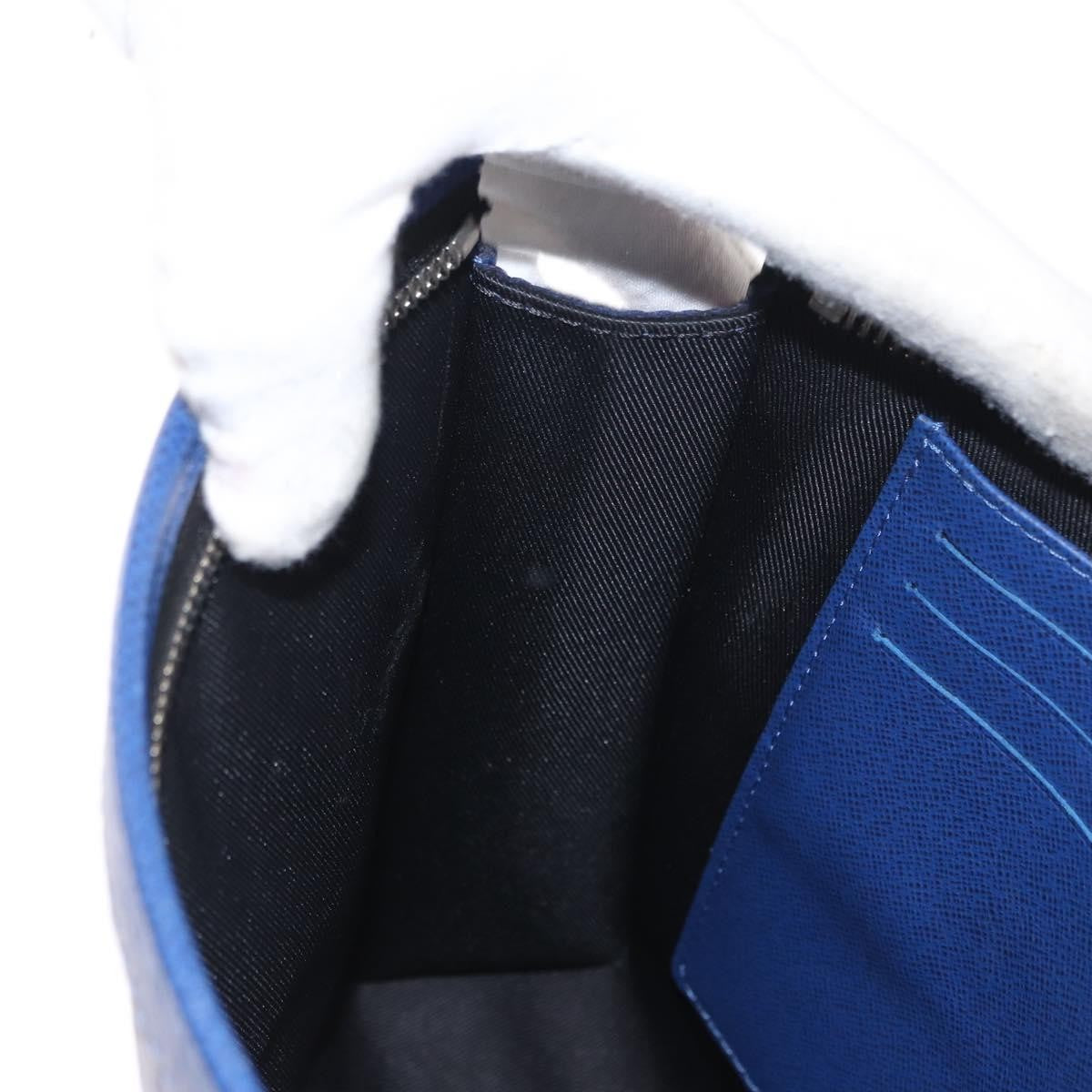 Louis Vuitton Pochette Voyage Taiga Leather, Blue, Leather, Clutch
