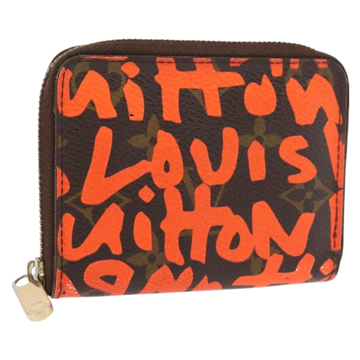 Louis Vuitton Porte-Monnaie Zippy Wallet monogramme empreinte, Orange, Canvas, Wallet