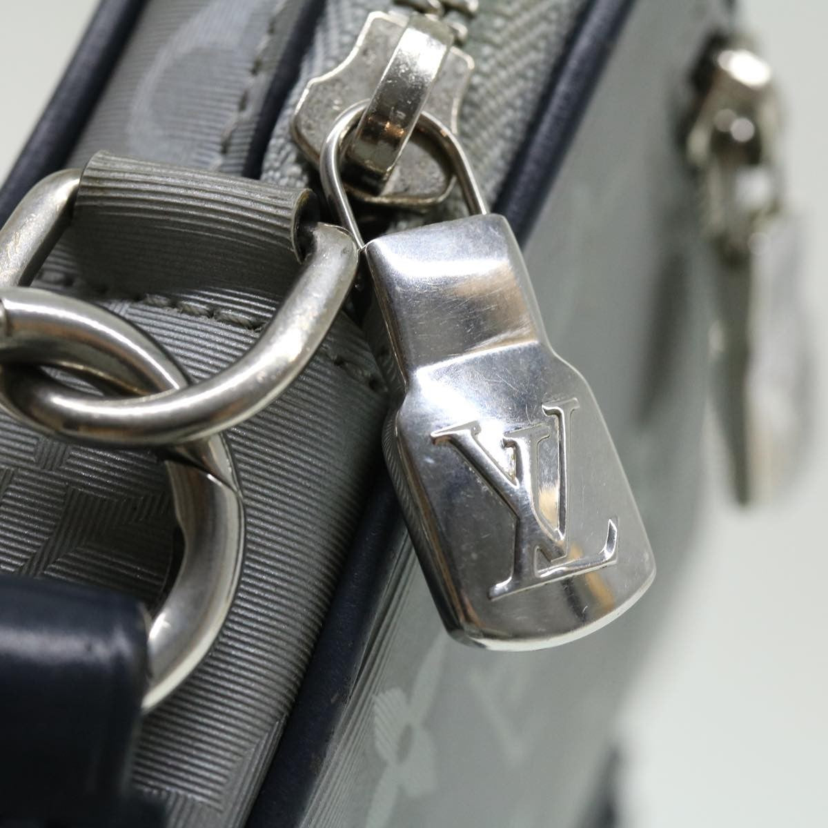 Louis Vuitton Alpha Clutch Limited Edition Monogram Satellite Canvas, SILVER, NYLON, Clutche & pouche