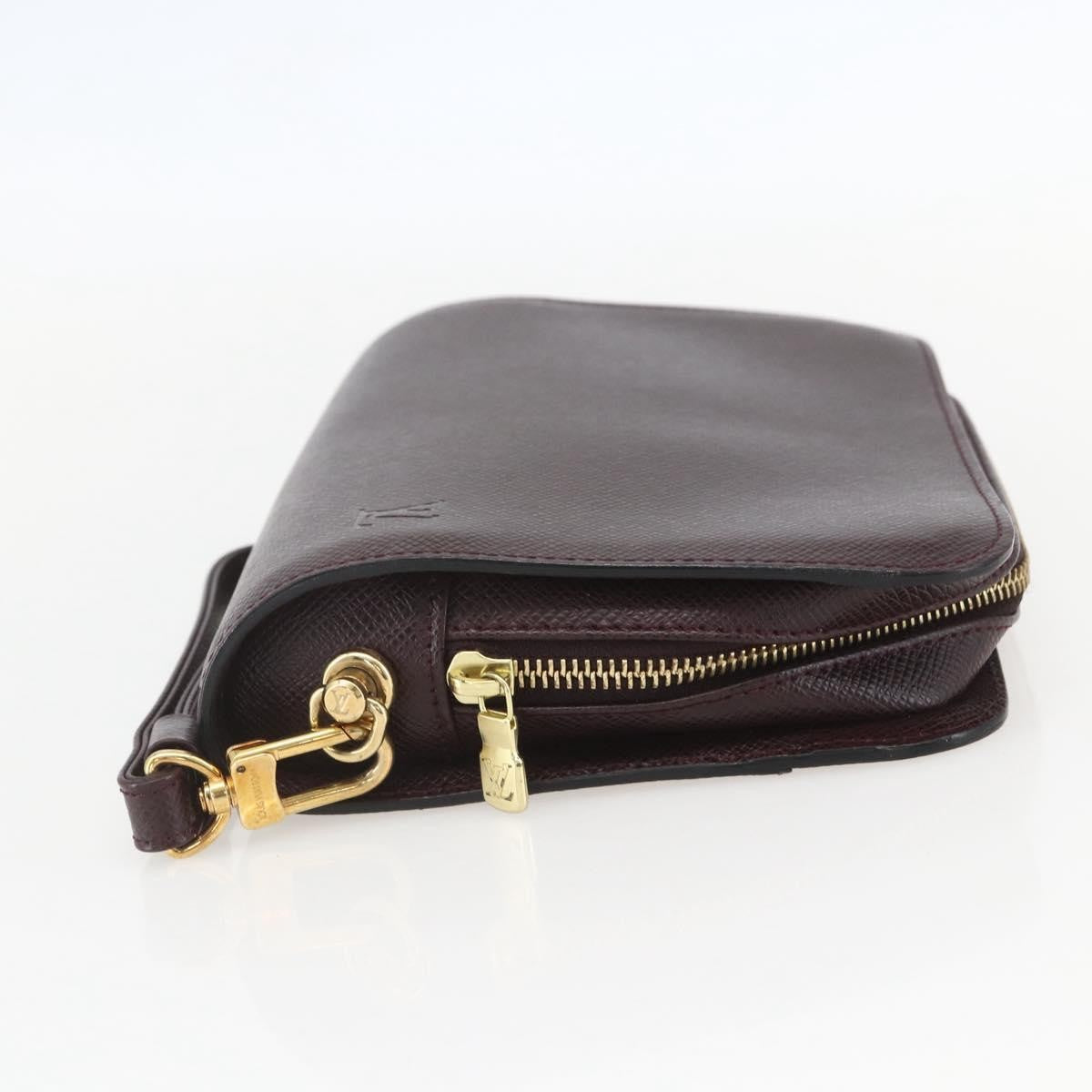 Louis Vuitton Pochette Baikal Clutch Taiga Leather, BROWN, LEATHER, Clutche & pouche