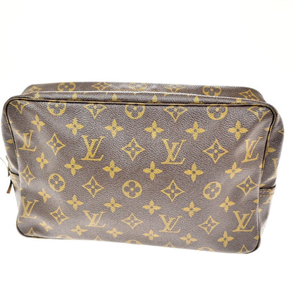 Louis Vuitton Trousse Toilette Monogram Canvas, BROWN, CANVAS, Clutche & pouche