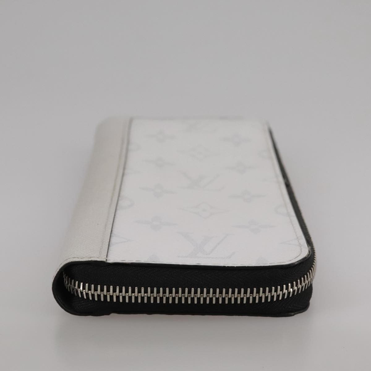 Louis Vuitton Zippy wallet vertical Taiga leather, WHITE, LEATHER, Wallets