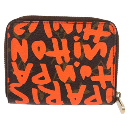 Louis Vuitton Porte-Monnaie Zippy Wallet monogramme empreinte, Orange, Canvas, Wallet