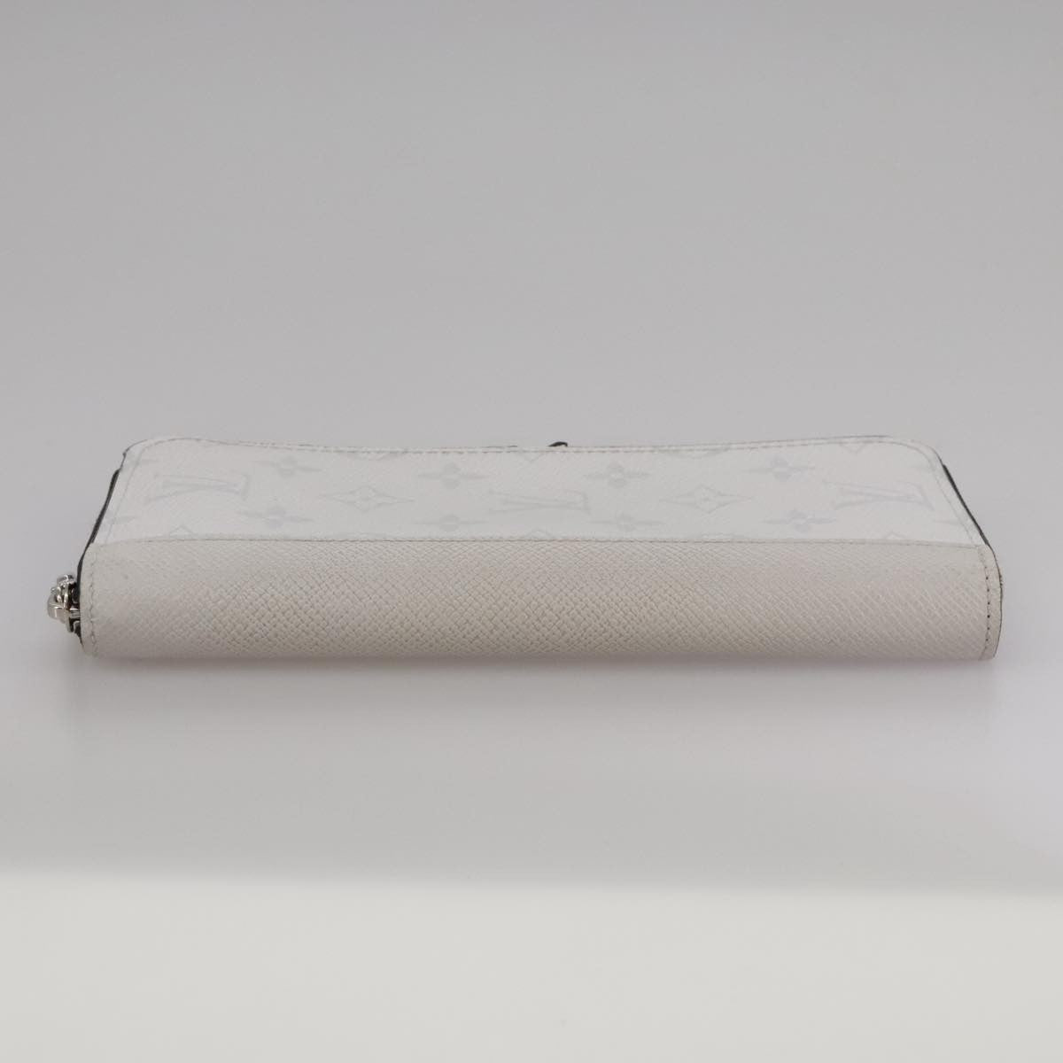 Louis Vuitton Zippy wallet vertical Taiga leather, WHITE, LEATHER, Wallets
