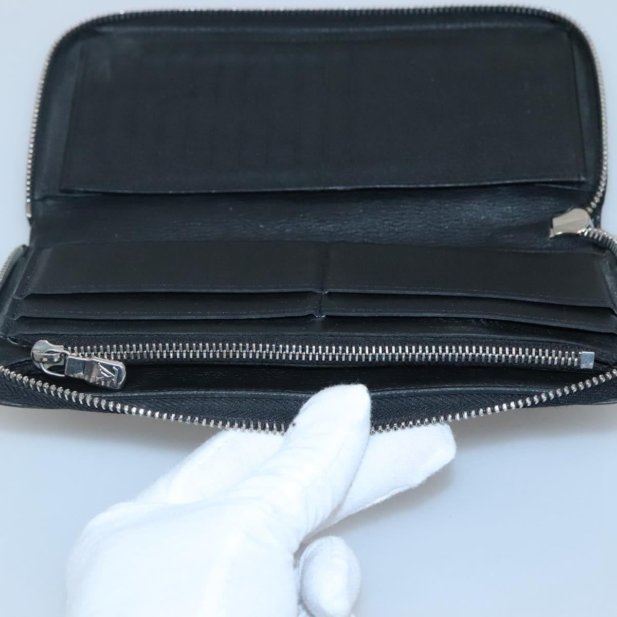 Louis Vuitton Zippy wallet vertical Taurillon Leather, BLACK, LEATHER, Wallets