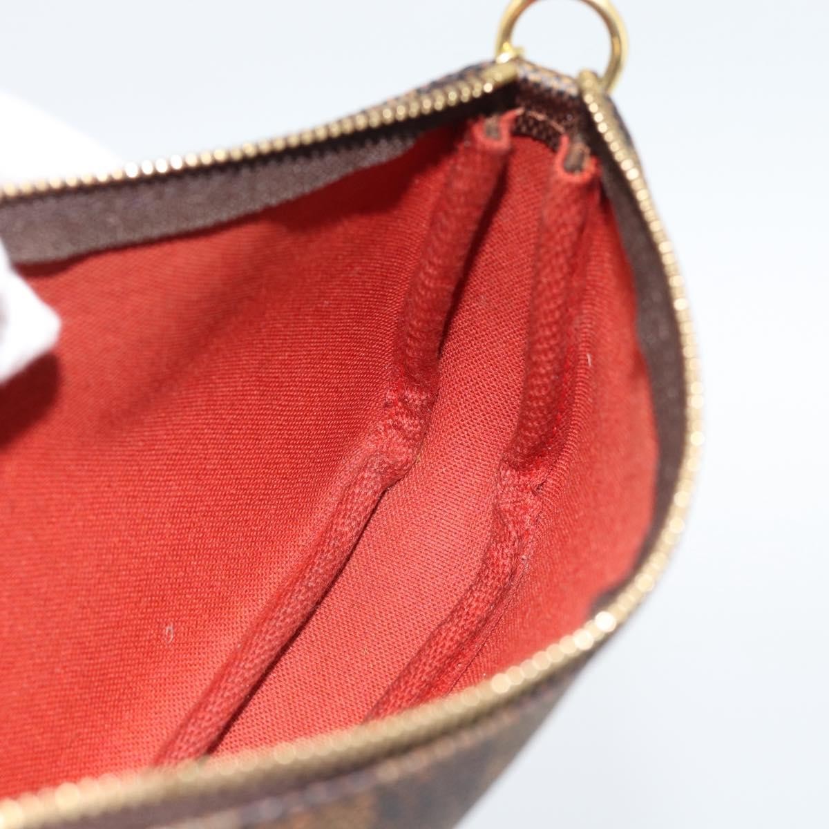 Louis Vuitton Mini pochette accessoires Damier Canvas, Brown, Canvas, Clutch