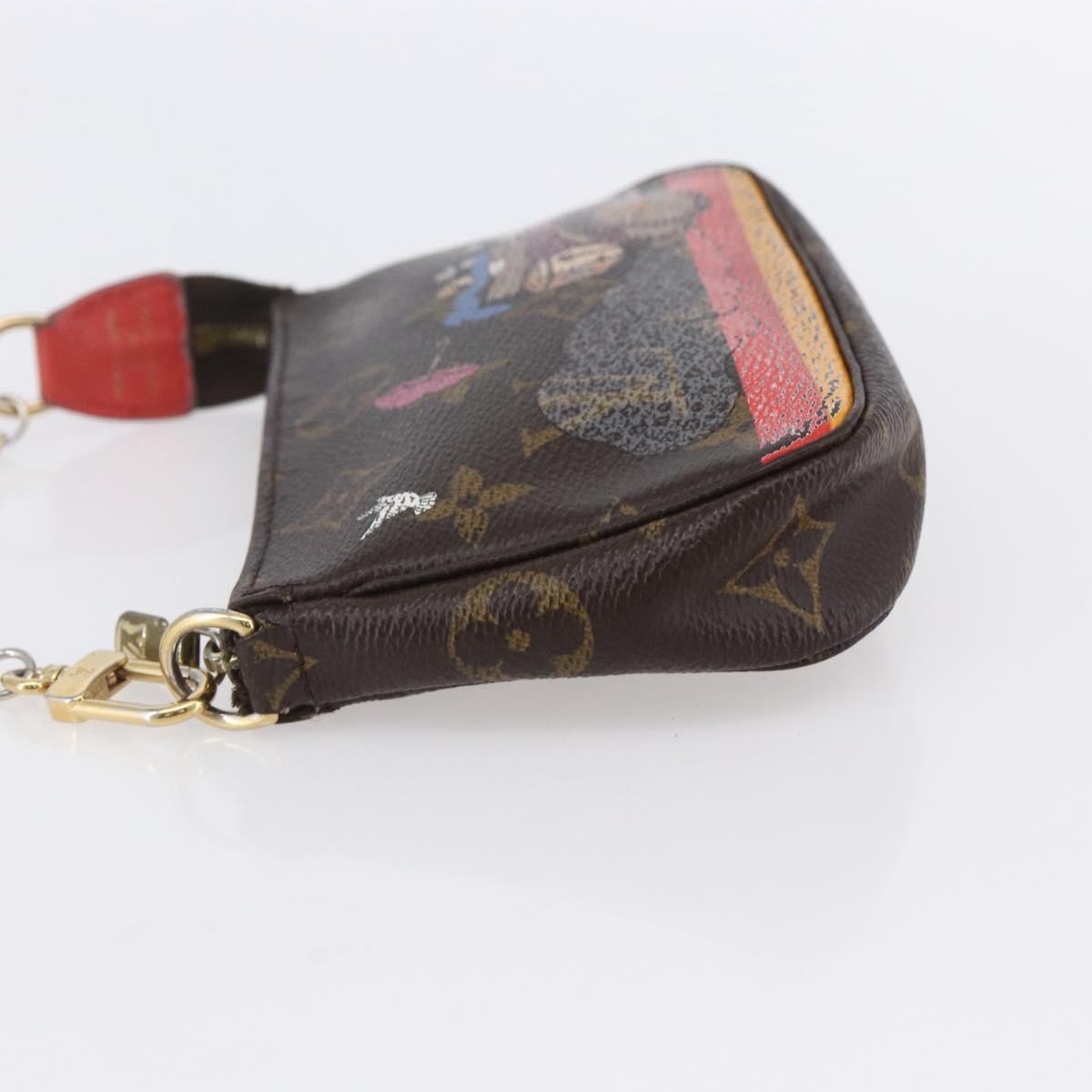 Louis Vuitton Pochette Accessoires Limited Edition Christmas Animation Monogram Canvas, BROWN, CANVAS, Clutche & pouche