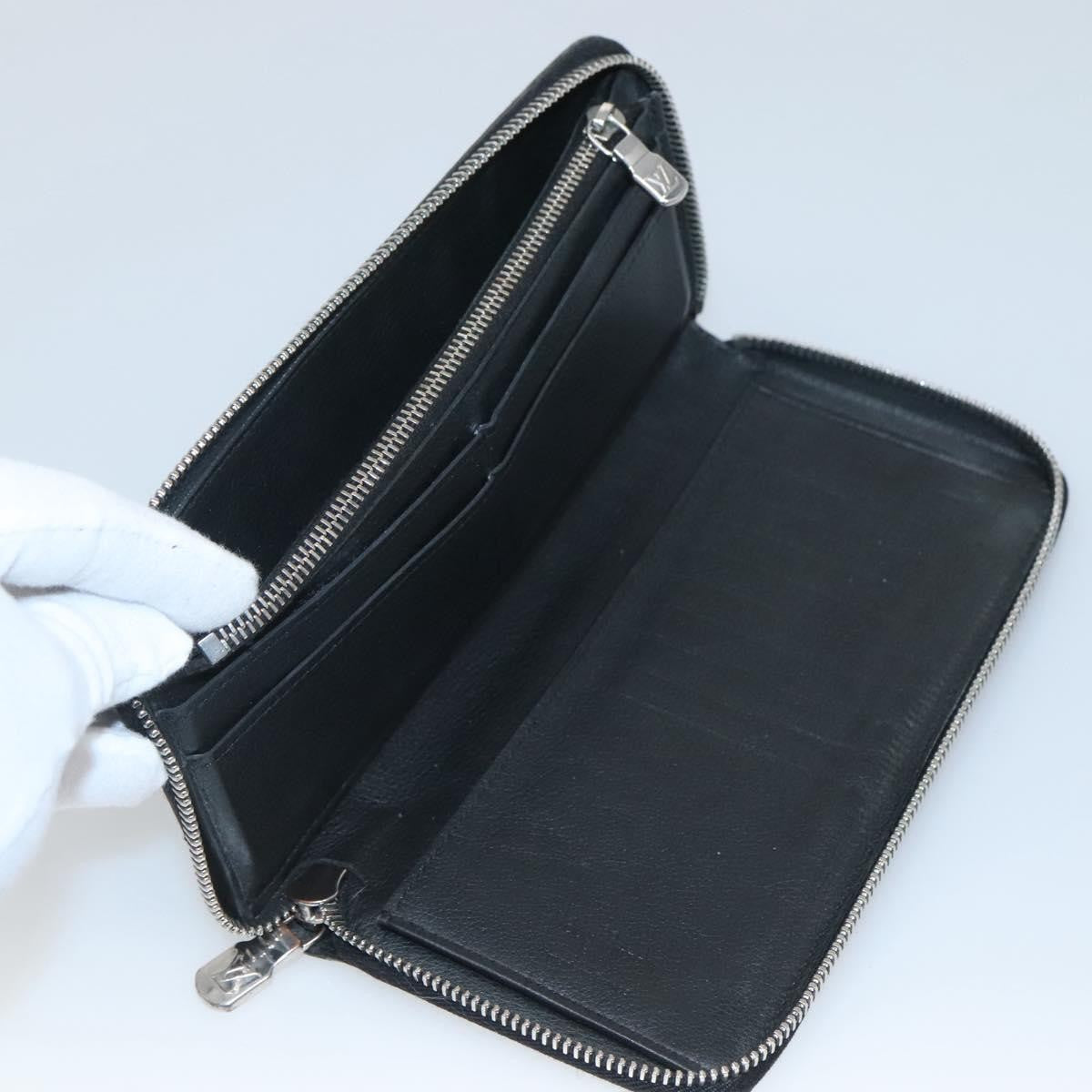 Louis Vuitton Zippy wallet vertical Taurillon Leather, BLACK, LEATHER, Wallets