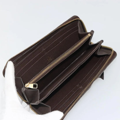 Louis Vuitton Zippy Wallet NM Leather Empreinte, Brown, Leather, Wallet