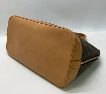 Louis Vuitton Alma Monogram Canvas, Brown, Canvas, Handbag