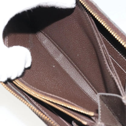 Louis Vuitton Zippy Wallet NM Leather Empreinte, Brown, Leather, Wallet