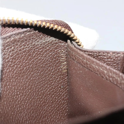 Louis Vuitton Zippy Wallet NM Leather Empreinte, Brown, Leather, Wallet