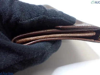 Louis Vuitton Zippy wallet vertical, Brown, Canvas, Wallet