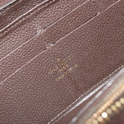 Louis Vuitton Zippy Wallet NM Leather Empreinte, Brown, Leather, Wallet