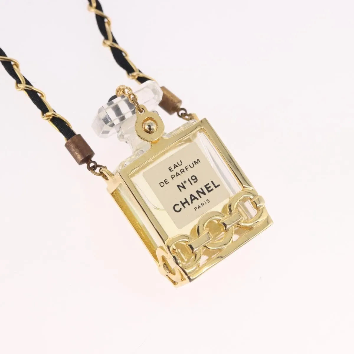 "Chanel CC Perfume Bottle Pendant Chain Long Metal with Leather, Crystals and Faux Pearl", Gold, Metal, Necklace