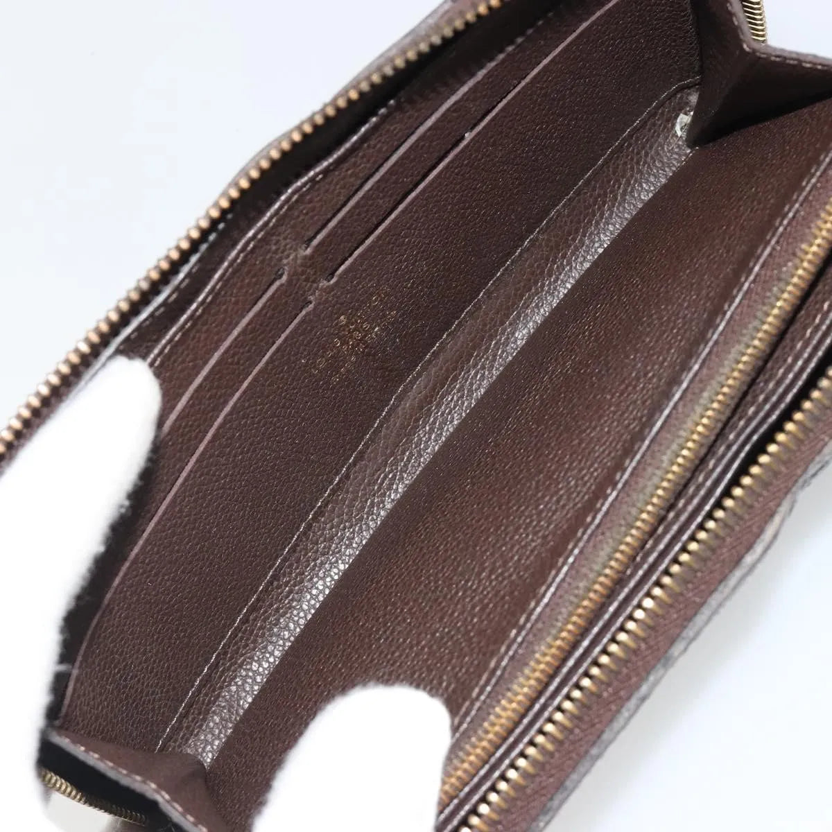 Louis Vuitton Zippy Wallet NM Leather Empreinte, Brown, Leather, Wallet